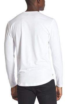 Made from a soft cotton blend, a versatile long-sleeve T-shirt enhanced with a curved hem is an instant closet favorite that looks great alone or layered. Crewneck Long sleeves 62% polyester, 33% cotton, 5% spandex Machine wash, tumble dry Imported Long Sleeve Cotton T-shirt For Loungewear, Stretch Long Sleeve T-shirt For Layering, Cotton Long Sleeve T-shirt For Loungewear, White Crew Neck Long Sleeve Top For Layering, Spring Cotton T-shirt With Curved Hem, Casual Cotton Tops With Curved Hem, White Cotton Crew Neck Long Sleeve Top, White Cotton Long Sleeve Crew Neck Top, Stretch Long Sleeve T-shirt For Everyday