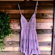 Beautiful Never Worn Mini Sun Dress Perfect For Summer. Pair With Your Favorite Cowgirl Boots Or Sandals. Tie Back With Stretchy Waist. I’m 5’10 , Hits Mid Thigh. Purple Spaghetti Strap Beach Dress, Purple Mini Sundress, Purple Beach Sundress With Spaghetti Straps, Purple Sundress With Spaghetti Straps For Beach, Purple Spaghetti Strap Sundress For Beach, Purple Sundress With Spaghetti Straps, Purple Ruffled Sundress For Summer, Lavender Mini Dress With Spaghetti Straps For Summer, Purple V-neck Sundress For Spring