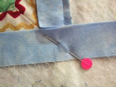 a piece of fabric is being sewn together