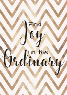 the words find joy in the ordinary written on a gold and white chevron background