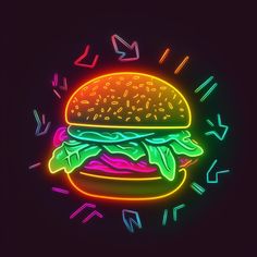 a neon burger with lots of confetti on it