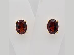 2.80ctw oval garnet 14k yellow gold over sterling silver stud earrings. Formal Oval Jewelry With Birthstone, Oval Birthstone Jewelry For Formal Occasions, Formal Oval Jewelry With Matching Earrings, Garnet Jewelry With Prong Setting For Formal Occasions, Oval Birthstone Earrings For Formal Occasions, Classic Faceted Yellow Gold Jewelry, Formal Garnet Jewelry With Prong Setting, Formal Oval Faceted Jewelry, Classic Oval Birthstone Jewelry