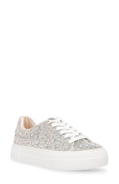 A symphony of glimmering crystals amplify a casual low top sneaker, while a hearty bumper-trimmed platform complete this strut-worty style. 1" platform Lace-up vamp closure Rhinestone and textile upper/textile lining/rubber sole Imported How To Style Bell Bottoms, Water Shoes Women, Sparkle Shoes, Rhinestone Shoes, Bling Shoes, Toes Designs, Betsy Johnson, Platform Sneaker, Best Sneakers