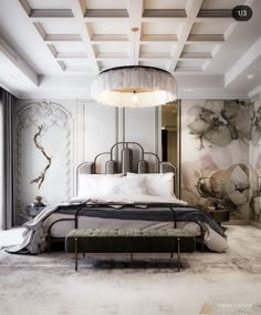 a large bed sitting under a chandelier in a bedroom