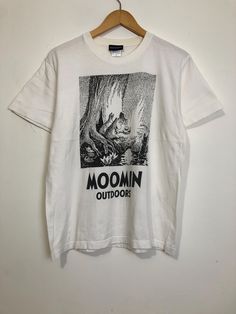 Moomin outdoors T-Shirt Pre-owned: Good condition Size on Tag M Measurement Pit to pit 20.5" Length 26" I do combined shipping Cotton Graphic Print T-shirt For Outdoor, Outdoor Cotton T-shirt With Graphic Print, White Graphic Print T-shirt For Hiking, White Logo Print Top For Outdoor, Outdoor Cotton T-shirt With Front Print, White Cotton T-shirt For Outdoor, Casual White T-shirt For Hiking, Moomin Shirt, Moomin Merch