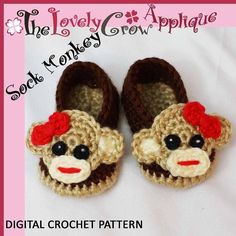 a pair of crocheted shoes with a monkey face