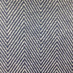 a blue and white rug with an interesting pattern on the bottom half of it,