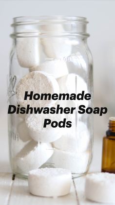 marshmallows in a mason jar with text overlay that reads diy dishwasher foods all natural recipe