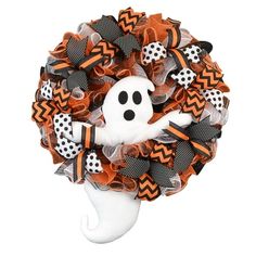 a halloween wreath with a ghost on it