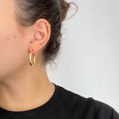 Hollow gold tube hoops - bold on the lobes with a comfortable on the lobes, no matter how long you're wearing them for! Yellow gold hoops are a staple in anyone's jewelry suite, and these fit the bill quite nicely. 14kt yellow gold Measures 1" in length, 3mm thick 1.8 grams Timeless Everyday Huggie Hoop Earrings, Timeless Huggie Hoop Earrings For Everyday, Everyday Timeless Huggie Hoop Earrings, Timeless Everyday Hoop Earrings, Minimalist Yellow Gold Hoop Wrap Earrings, Tarnish Resistant Small Hoop Wrap Earrings For Everyday, Oval Hoop Earrings For Everyday, Everyday Oval Hoop Earrings For Pierced Ears, Modern Yellow Gold Hoop Wrap Earrings