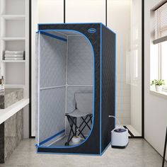 an open shower stall in the middle of a bathroom