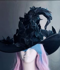 Transform your Halloween costume into a bewitching masterpiece with our black witch hats decorated with whimsical butterflies. Unleash your creativity with a variety of butterfly colors to match your unique style. Choose from black, purple, orange, a mix, and more! Whether you're brewing potions, casting spells, or just looking to turn heads, this hat will add an extra layer of magic to your ensemble.


Age Group/Gender - Adult/Unisex

Size/Type - One size fits all adults

Hat Base Color - Black Butterfly Witch, Sorcerer Hat, Masquerade Mask Costume, Halloween Costume Hats, Tall Hat, Black Witch Hat, Hallowen Ideas, Wizard Hat, Witch Hats