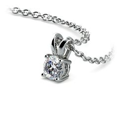 a diamond pendant on a chain with the center stone in white gold and setting at an angle