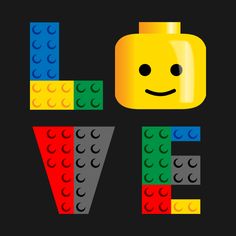 the word love is made out of legos and bricks with a smiley face on it