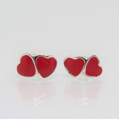 Vintage Sterling Silver Red Enamel Hearts Stud Earrings...Marked 925...Total of weights 1.1grams...Measure H 6.1MM W 10MM...These are in very good condition. Red Vintage Sterling Silver Earrings, Nickel-free Red Heart Earrings, Red Enamel Clip-on Earrings, Vintage Red Clip-on Earrings, Red Enamel Vintage Earrings, Silver Mermaid, Heart Studs, Heart Earrings Studs, Earrings Photo