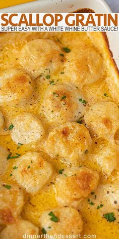 a casserole dish with potatoes and cheese in it on a white plate next to a yellow napkin