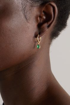 House of Meraki's 18-karat gold hoop earrings are strung with Gemfields Zambian emeralds charms that'll capture any gaze. Love them? Explore our Fine Jewelry edit that showcases Gargi Rathi's love for the stone across an array of pieces. Elegant Small Hoop Emerald Jewelry, Elegant Small Hoop Emerald Earrings, Small Hoop Emerald Jewelry For Gifts, Elegant Green Dangle Huggie Earrings, Elegant Emerald Huggie Hoop Earrings, Yellow Gold Emerald Huggie Jewelry, Fine Jewelry Emerald Teardrop Earrings, Emerald Teardrop Earrings Fine Jewelry, Fine Jewelry Emerald Huggie Earrings