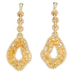 18 kt. yellow gold earrings with diamonds and yellow sapphires. This exceptional pair of earrings is hand-made in Italy, signed by Fraleoni. Fraleoni is a jewelry brand located in Rome, Italy. One of a kind piece. 2010 Round cut Diamonds: 5.90 cts. ( H color - VVS1-VVS2 ) Double rose-cut yellow sapphires: 18.40 cts. Weight: 38.50 Double Rose, Diamonds Earrings, Yellow Gold Earrings, Jewelry Brand, Yellow Gold Earring, Yellow Sapphire, Rome Italy, Sapphire Diamond, Round Cut Diamond