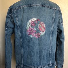 All Of My Embroidered Items Are Unique & One Of A Kind. This Is A Gorgeous Lucky Brand Embroidered Jean Jacket In A Ladies Size Xl. It Is The Tomboy Trucker Style Lucky Brand Denim Jacket With Pastel Flowers & Butterfly Embroidered On The Back. This Design Contains 35,000 Stitches. It Has 2 Chest Pockets W/Button Closure & Side Seam Pockets. All Of My Embroidered Items May Be Personalized For An Additional Fee. Msrp On Blank Jacket Is $99. Want A Different Design-Message Me-I Do Special Orders. Blue Embroidered Relaxed Fit Outerwear, Blue Embroidered Outerwear With Relaxed Fit, Embroidered Denim Outerwear With Relaxed Fit, Embroidered Relaxed Fit Denim Jacket, Embroidered Cotton Denim Jacket For Fall, Relaxed Fit Embroidered Denim Outerwear, Embroidered Denim Blue Outerwear, Custom Embroidered Cotton Outerwear For Fall, Denim Blue Long Sleeve Outerwear With Floral Embroidery