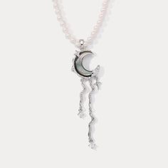 The Lunar Tide Pearl Necklace puts the moon at your neck! This dazzling pendant necklace features a pearl that looks like a full moon, an iconic symbol of serenity and tranquility. Put on this necklace and float away to your own lunar paradise. DETAILS Materials:   Platinum on Brass, Mother of Pearl Beads, Zircon Measurements: Length:  17.72 "(45cm)  + Extender: 1.97"(5cm) Pendant   Size :  2.48"*0.67"(6.3cm*1.7cm) Weight:  15.2 g Moon-shaped Clavicle Chain Necklace For Party, Moon Charm Pendant Necklace For Party, Moon Charm Pendant Necklaces For Party, Party Pendant Necklace With Moon Charm, Celestial Style Pearl Pendant Necklaces, Celestial Pendant Necklaces For Party, Lunar Tide, Blue Morpho Butterfly, Butterfly Gifts