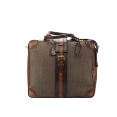 Ideal for the business traveler, the Travel Tote with the classic name tag and leather handles gives you that timeless briefcase style, measuring 14.2 x 16.5 x 6.3 inches / 36 x 42 x 16 cm. It has a main zip closure with a locking buckle strap to secure it. Designed to be functional and minimalist, it features an internal zipped pocket and a full lined interior. The removable shoulder strap makes it perfect for hands-free travel. THE DETAILS: *Burnished Materials: tweed sartorial + med brown pai Mens Travel, Travel Tote Bag, Brown Fabric, Tote Bag Leather, Travel Tote, Leather Travel, Leather Handles, Name Tag, Leather Fabric