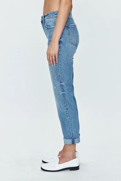 Riley Mid Rise Girlfriend Jeans Final sale | Not eligible for return or exchange Excluded from further discounts Introducing the Riley Mid Rise Girlfriend Jeans - a rolled crop jean with a medium blue wash. Elevate your denim game with this sophisticated and exclusive piece. Its cropped style is both chic and practical, perfect for showcasing your favorite shoes. Embrace luxury and style with the Riley Jean. Rolled Ankle, Denim Jogger Pants, Basic Shoes, Maxi Jumpsuit, Girlfriend Jeans, Casual Rompers, Denim Joggers, A Boyfriend, Stylish Clothes For Women