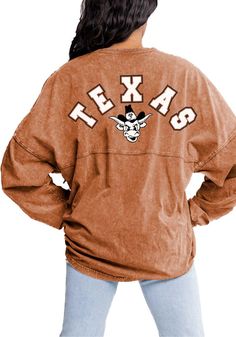 Display your Texas Longhorns spirit in this Texas Burnt Orange T-Shirt! This Texas Must Have Long Sleeve T-Shirt makes a great layer for cooler nights cheering on the Longhorns. Featuring a screen print team name and logo on center back with screen print team logo on left chest, this Texas Longhorns Long Sleeve LS Tee is a must-have for any fan. Hook Em Horns! Texas Tech Shirts Woman, Oversized Tops For College In Fall, Oversized Fall Tops For College, Trendy Oversized Top For Game Day, Oversized Spring College Tops, Spring Oversized Tops For College, Brown Long Sleeve Tops For College, Long Sleeve Tops For Game Day In Fall, Trendy Long Sleeve Tops For Game Day