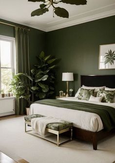 a bedroom with green walls, white carpet and a large bed in the center of the room