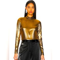 95% Polyester, 5% Spandex Machine Wash Mockneck Styling Gold-Tone Metallic Finish Trendy Metallic Tops For Fall, Chic Party Crop Top With Crew Neck, Chic Crew Neck Crop Top For Party, Fall Party Crop Top With Crew Neck, Fall Crew Neck Crop Top For Party, Chic Fitted Metallic Crop Top, Gold Tops For Night Out In Fall, Gold Tops For Fall Night Out, Trendy Gold Tops For Fall