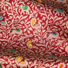 The Banarasi Shikargah saree is a masterpiece of craftsmanship, blending the elegance of Banarasi silk with intricate motifs inspired by the royal hunting scenes. Adorned with finely woven animals, birds, and floral patterns, these sarees exude opulence and heritage, making them a timeless choice for special occasions and celebrations. ﻿Click here to view the underskirt Silk Banarasi Saree, Saree Banarasi, Banarasi Silk Saree, Background Fabric, Katan Silk, Banarasi Saree, Banarasi Sarees, Silk Thread, Birds Of Paradise