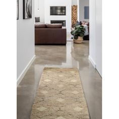 the hallway is clean and ready for us to use as an entrance way in this modern home