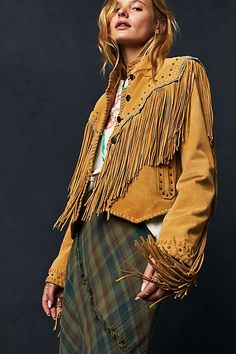 Leather Fringe Outerwear For Fall, Leather Jacket For Fall Festival, Winter Leather Outerwear With Tassels, Fall Leather Outerwear With Fringe, Winter Leather Tassel Outerwear, Long Sleeve Leather Jacket For Fall Festivals, Fall Festival Long Sleeve Leather Jacket, Chic Fall Outerwear With Rivets, Bohemian Winter Outerwear With Beaded Fringe