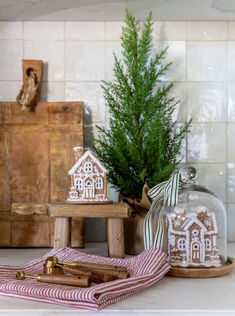 a kitchen counter with christmas decorations on it