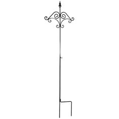 a black and white photo of a coat rack