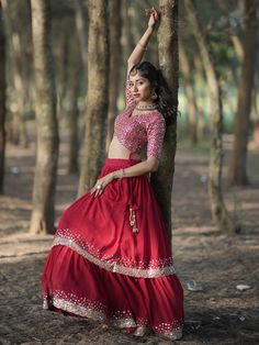 This exquisite set is the perfect choice for weddings, functions, and other ethnic occasions. Made from high-quality georgette material, the red color lehenga features intricate zari embroidered work and sequin work, adding a touch of elegance and glamour. The choli, made from a similar color georgette material, also boasts stunning sequin work, perfectly complementing the overall look. The set is completed with a matching net dupatta, adding a touch of sophistication to the ensemble.
The semi-s Red Sequined Georgette Sets, Red Floor-length Sharara With Mirror Work, Red Sequined Sets For Navratri, Designer Red Sequined Sets, Red Art Silk Sets With Mirror Work, Semi-stitched Red Sets With Mirror Work, Red Georgette Sharara With Dori Work, Red Georgette Floor-length Blouse Piece, Red Floor-length Georgette Blouse Piece