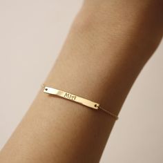 "Personalized Gold Bar Bracelet, Name Bracelet, 14K Solid Gold Bracelet, Simple Name Bar Bracelet, Layering Jewelry, Gifts for Her ≫ Product Details ◈ Handmade / Handcrafted Fine Jewelry ◈ Bar Size: 35mm x 4mm ◈ Thickness: 1.30mm ◈ Metal: Solid 14K Gold ◈ Gold Color: White gold, Rose gold, Yellow gold ◈ Chain Length: 6\" ~ 7.5\" ≫ Please read our FAQ below for more detail." 14k Gold Nameplate Bracelet For Everyday, Personalized Rectangular 14k Gold Bracelets, Everyday 14k Gold Nameplate Bracelet, Minimalist 14k Gold Nameplate Bracelet, Dainty 14k Gold Nameplate Bracelet, Classic Rose Gold Rectangular Bracelets, Elegant Name Bracelets With Rectangular Shape, Elegant Rectangular Bracelets With Name Detail, Elegant Rectangular Name Bracelets