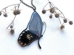 It is handcrafted exclusive design pendant made with glass and real butterfly wings. Each of our pendants can not be repeated exactly. The pendant can be worn on both sides. It will be nice anniversary gift. All jewelry comes in a cardboard box ready to be gift wrapped. And other unique jewelry here https://www.etsy.com/shop/RosavaGlassStore We accept only PayPal. Item is ready to ship, we will send it within 1-3 bussines days after payment confirmation. We do not ship on Saturdays and Sundays. Black Butterfly Charm Jewelry, Black Butterfly-shaped Jewelry For Gift, Black Butterfly Jewelry For Gift, Elegant Black Butterfly Charm Necklace, Handmade Black Butterfly Jewelry, Butterfly Pendant Necklace For Gifts, Butterfly Pendant Necklace As A Gift, Butterfly Pendant Necklace For Gift, Black Butterfly Necklace For Gift