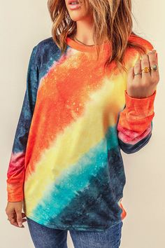 This Ombre Tie-Dye Long Sleeve Top is the perfect addition to your wardrobe. Crafted from a lightweight and breathable 95% Polyester and 5% Spandex blend, this top is designed to keep you comfortable all day long. The ombre tie-dye pattern adds a unique touch to this classic style, making it a great choice for any occasion. The long sleeves and relaxed fit provide a flattering silhouette that is sure to turn heads. Whether you're heading to the office or out for a night on the town, this ... Casual Ombre Cotton Tops, Casual Tie Dye Top With Watercolor Print, Casual Tie Dye Watercolor Print Top, Spring Tie-dye Tops With Watercolor Print, Spring Tie Dye Top With Watercolor Print, Multicolor Soft-washed Relaxed Fit Tops, Trendy Gradient Color Tops For Spring, Tie Dye Crew Neck Top With Rainbow Print, Tie Dye Rainbow Print Crew Neck Top