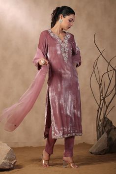 Pink velvet kurta with floral embroidered yoke and sleeve hem. Comes with chanderi pant and dupatta.
Components: 3
Pattern: Embroidered
Type Of Work: Sequins, Pearls, Cutdana
Neckline: Notched
Sleeve Type: Three Quarter
Fabric: Kurta: Velvet, Pant: Chanderi, Dupatta: Organza
Color: Pink
Other Details: 
Attached lining
Approximate product weight: 0.5-1 kg
Occasion: Wedding - Aza Fashions Festive V-neck Kurta With Dabka Detailing, Festive Embellished Pink Kurta, Semi-stitched Velvet Kurta With Resham Embroidery, Embroidered Semi-stitched Velvet Kurta, Pink Silk Kurta With Cutdana Detail, Velvet Kurta, Pink Velvet, Three Quarter, Aza Fashion