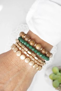 Are you looking for that perfect bracelet set to perfect your Bohemian Vibes?! You're in luck! This set of 5 bracelets is made up of gorgeous forest greens, worn golds & neutral browns. Bracelet Set includes 5 individual bracelets Stretchy--one size fits most! Color: Forest green, browns and worn golds Affordable Personalized Green Stretch Bracelet, Green Bohemian Stretch Bracelet For Everyday Wear, Earthy Adjustable Gold Bracelet, Earthy Green Beaded Bracelets For Everyday, Gold Earthy Bracelets With Round Beads, Gold Bracelet Stack, Boho Bracelets Stack, Gold Bracelets Stacked, Bohemian Vibes