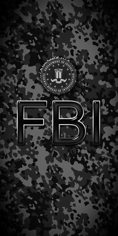 the f b i logo on a black camouflage print wallpaper with silver foil lettering