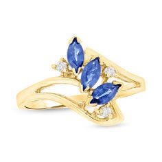 Redefine elegance with this splendid gemstone ring. Crafted in warm 14K gold, this captivating design highlights a trio of 5.0 x 2.5mm marquise-cut bright blue sapphires, each set at a graceful diagonal across the ring's bypassing split shank. Sparkling diamond accents add a touch of whimsy and shimmer to the look. Simply marvelous, this ring is buffed to a brilliant luster. Marquise Sapphire Gemstone Ring, Marquise Birthstone Ring In 14k Gold, Marquise Sapphire Birthstone Ring For Anniversary, Marquise Sapphire Ring Birthstone For Anniversary, Marquise Sapphire Ring With Prong Setting, Marquise Cut Sapphire Ring In Fine Jewelry Style, 14k Gold Marquise Birthstone Ring, Marquise Yellow Gold Birthstone Ring In Fine Jewelry Style, Fine Jewelry Marquise Birthstone Ring In Yellow Gold