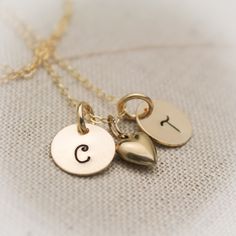 14K Gold Filled Couples Two Initial Monogram Necklace with Heart Charm Hand Stamped Personalized. $38.95, via Etsy. Personalized Gold Heart Charm Necklace, Personalized Initial Pendant Necklace In 14k Gold Filled, Personalized 14k Gold Filled Initial Pendant Necklace, 14k Gold Filled Personalized Initial Pendant Charm Necklace, Gold Stamped Initial Pendant Charm Necklace, Gold Personalized Heart Pendant Charm Necklace, Personalized Gold Heart Pendant Initial Necklace, Personalized Gold Heart Pendant Charm Necklace, Personalized Stamped Gold Charm Necklace