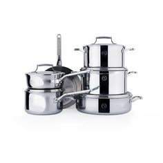 stainless steel pots and pans stacked on top of each other