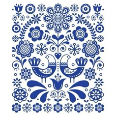 blue and white floral ornament with birds in the center on a white background