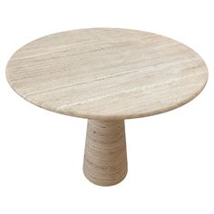 a round marble table on a white background