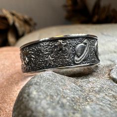 This Solid Sterling Silver Crescent Moon & Stars ring with an entire tiny universe on the band. The ring is adorned with an intricate celestial detail that goes all around the band - an artful rendition of the traditional design. Oxidized finish combines with polished detailing lets the tiny moons, stars, planets and sun stand out. Meticulously crafted from fine sterling silver with beautiful detailing, this Celtic Moon & Stars ring showcases the beauty of Celtic tradition, modern design, and fi Stars Ring, Celtic Moon, Celtic Traditions, Crescent Moon Ring, Moon And Star Ring, Moon Ring, Crystal Design, Moon Stars, Star Ring