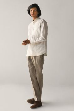 White shirt with all-over fuselage fagotting detailing, patch pocket and full sleeves.
Component: 1
Embroidered
Neckline: Collar
Sleeve Length: Full
Fabric: Linen Cotton 
Color: White
Fuselage hand embroidery
Note: The pant worn by the model is not for sale - Aza Fashions Men Shirts Casual, Fabric Pants, Embroidered Neckline, Full Sleeves, Casual Shirt, Casual Shirts For Men, White Linen, Aza Fashion, Full Sleeve