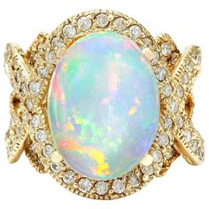 8.88 Carat Natural Opal 14K Solid Yellow Gold Diamond Ring Item Type: Ring Item Style: Cocktail Material: 14K Yellow Gold Mainstone: Opal Stone Color: Multicolor Stone Weight: 6.88 Carat Stone Shape: Oval Stone Quantity: 1 Stone Dimensions: 16.00x12.00 mm Stone Creation Method: Natural Stone Treatment Method: Not-treated Gemstone 1: Diamond Stone Color: F-G Stone Clarity: VS2-SI1 Stone Weight: 2.00 Carat Stone Shape: Round Stone Creation Method: Natural Stone Treatment Method: Not-treated Total Sapphire Cocktail Ring, Opal Diamond Ring, Yellow Gold Diamond Ring, Diamond Cocktail Rings, Gold Diamond Ring, La Face, Royal Jewelry, Oval Stone, Gold Diamond Rings