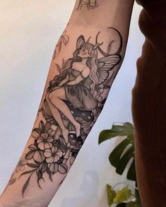 a person with a tattoo on their arm